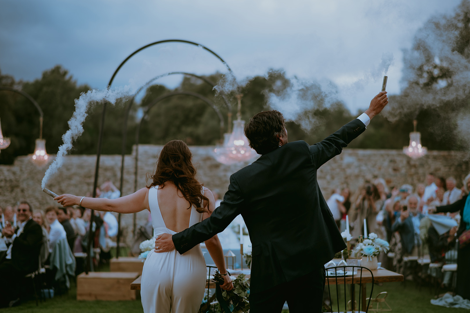 epic-wedding-entrance-at-mas-toroella-spain