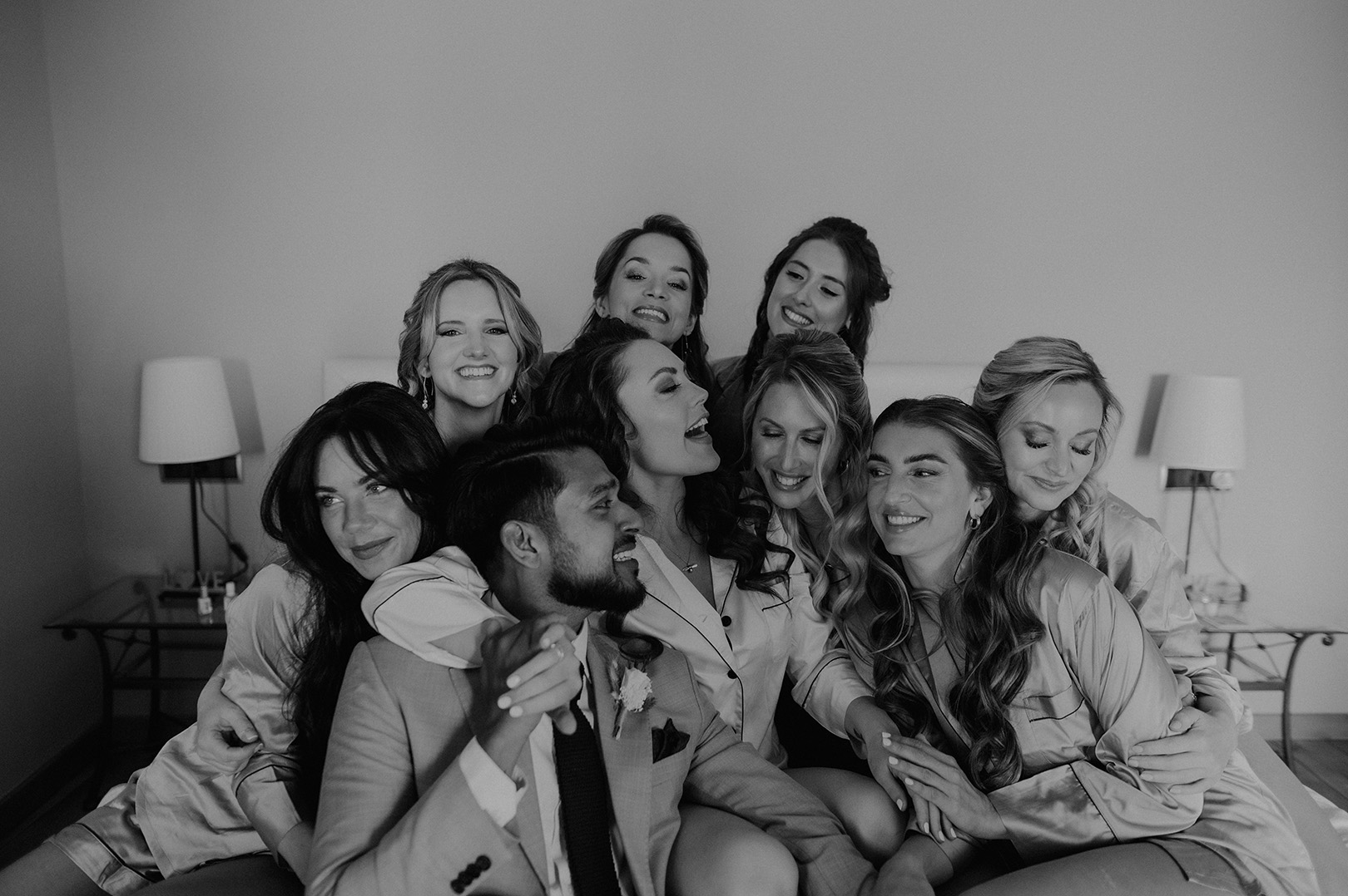 bridesmaids-and-bridesman-celebrating-before-wedding