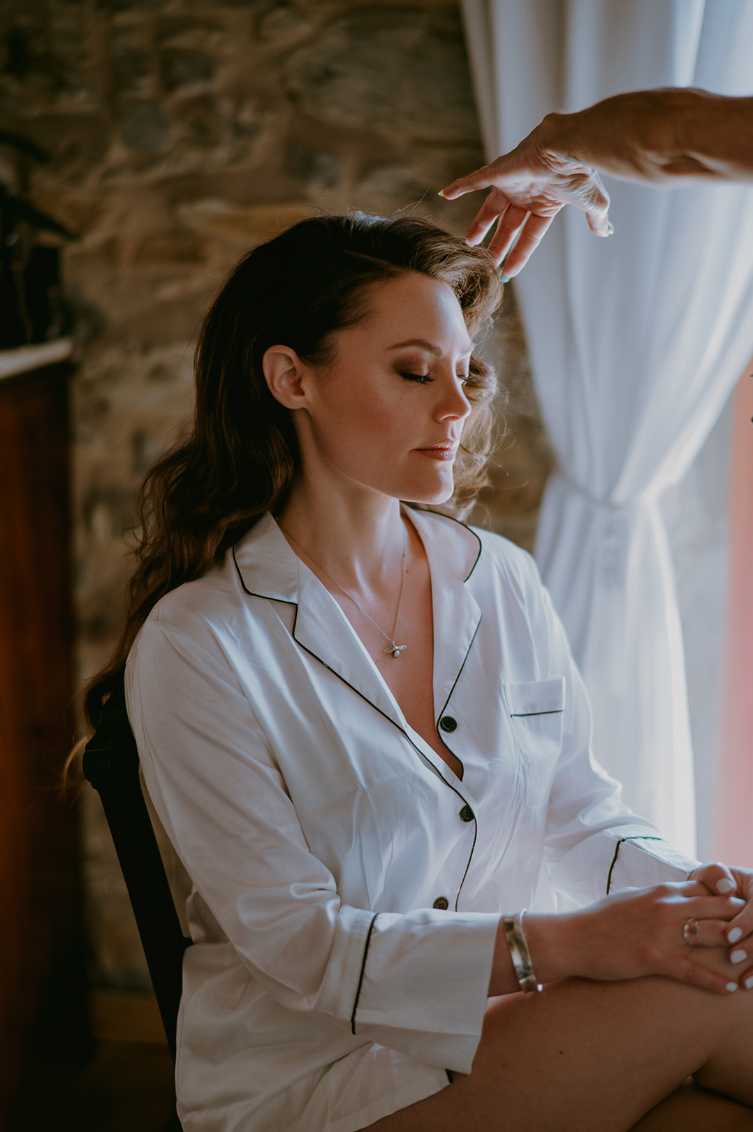 beautiful-bride-getting-hair-and-makeup-done