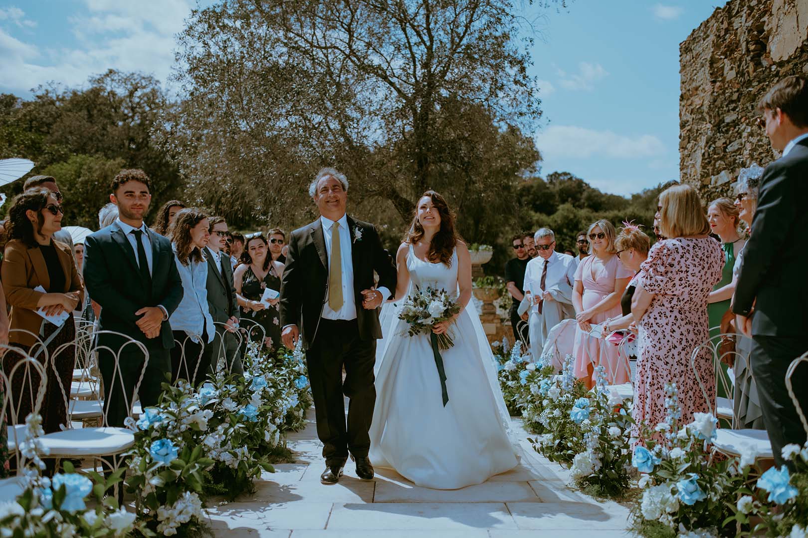 bride-and-father-walking-down-the-aisle-at-mas-torroella-wedding